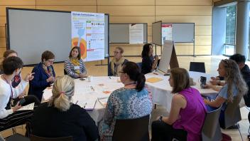 Kara Schilli, Heather Riden, and Whitney Pennington lead a roundtable discussion on engaging agricultural stakeholders through strategic communications