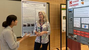 Farzaneh Khorsandi discusses one of her posters about All-Terrain Vehicle Safety in Agriculture