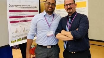 Vicente Munguia and Amjad Ramahi with their posters