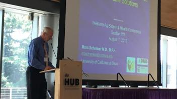 Dr. Marc Schenker opens the Hired and Contract Ag Workforce session