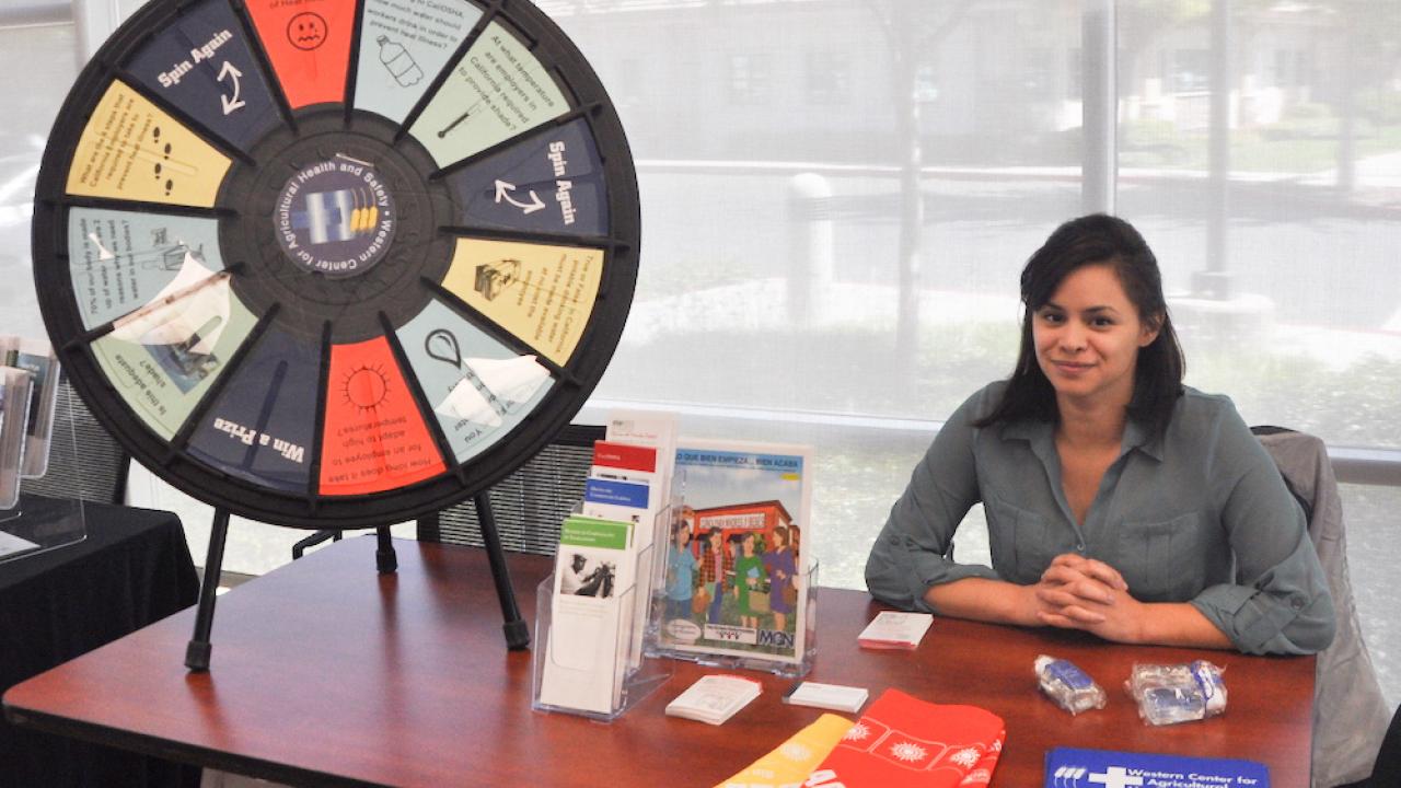 Leslie Olivares with the roulette wheel