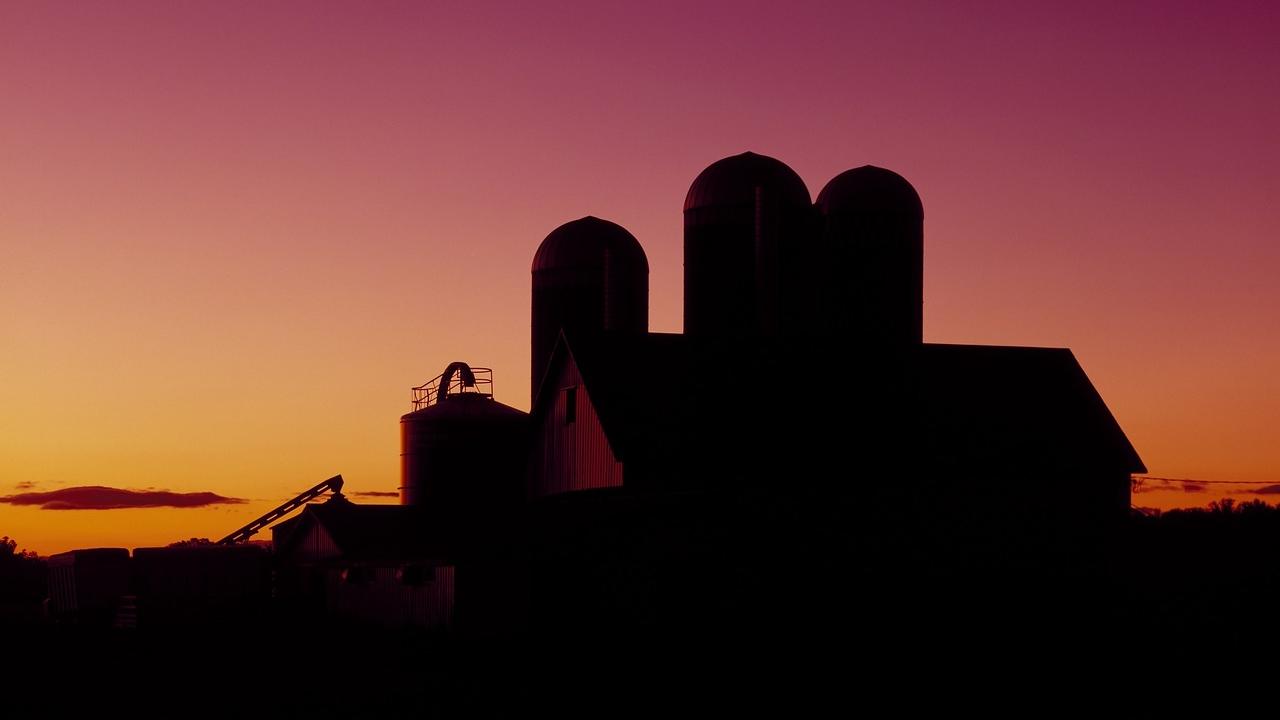 We are grateful to keep working toward keeping farmers, farmworkers and their families and communities safe and healthy Dairy barn at sunset