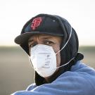 Farmworker wearing N95 respirator